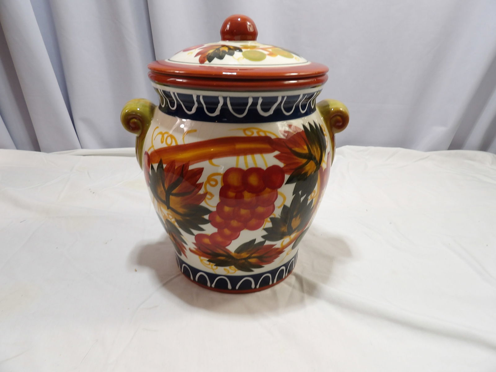 Handpainted Cookie Jar: 10" Tall Hand Painted Cookie Jar. All measurements are approximate. Please see photos for condition and details. Selling as is from 04281.