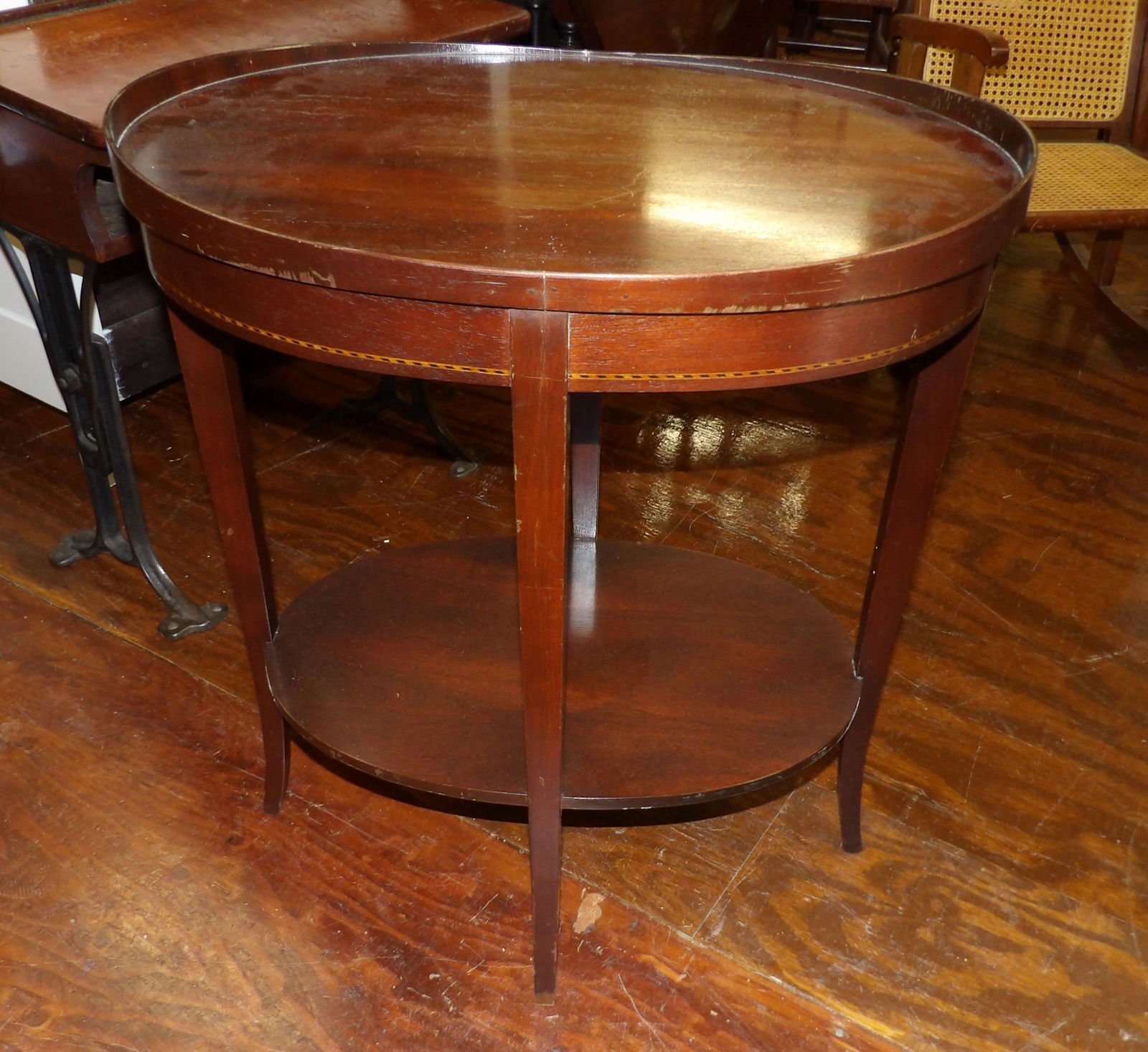 Oval Shaped End Table: Oval Shaped End Table, 23" Wide X 20" Tall. All measurements are approximate. Please see photos for condition and details. Selling as is from 04281.
