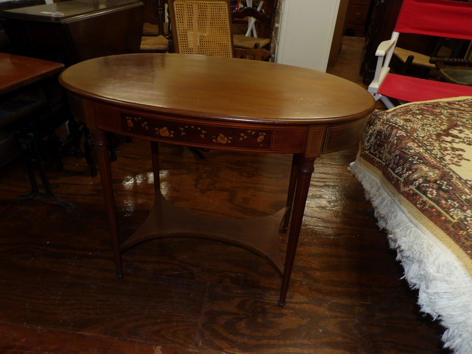 Oval End Table: Beautiful Oval End Table, 33" Wide X 25" Tall. All measurements are approximate. Please see photos for condition and details. Selling as is from 04281.