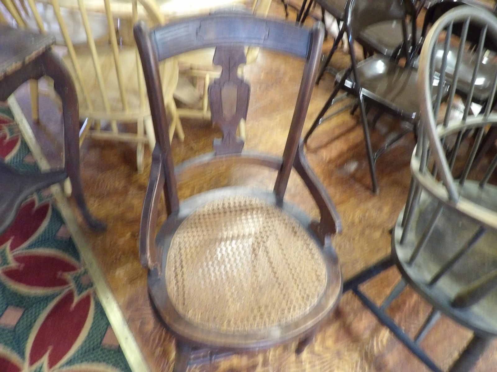 Solid Hardwood Chair: Solid Caned Seat Hardwood Chair. All measurements are approximate. Please see photos for condition and details. Selling as is from 04281.