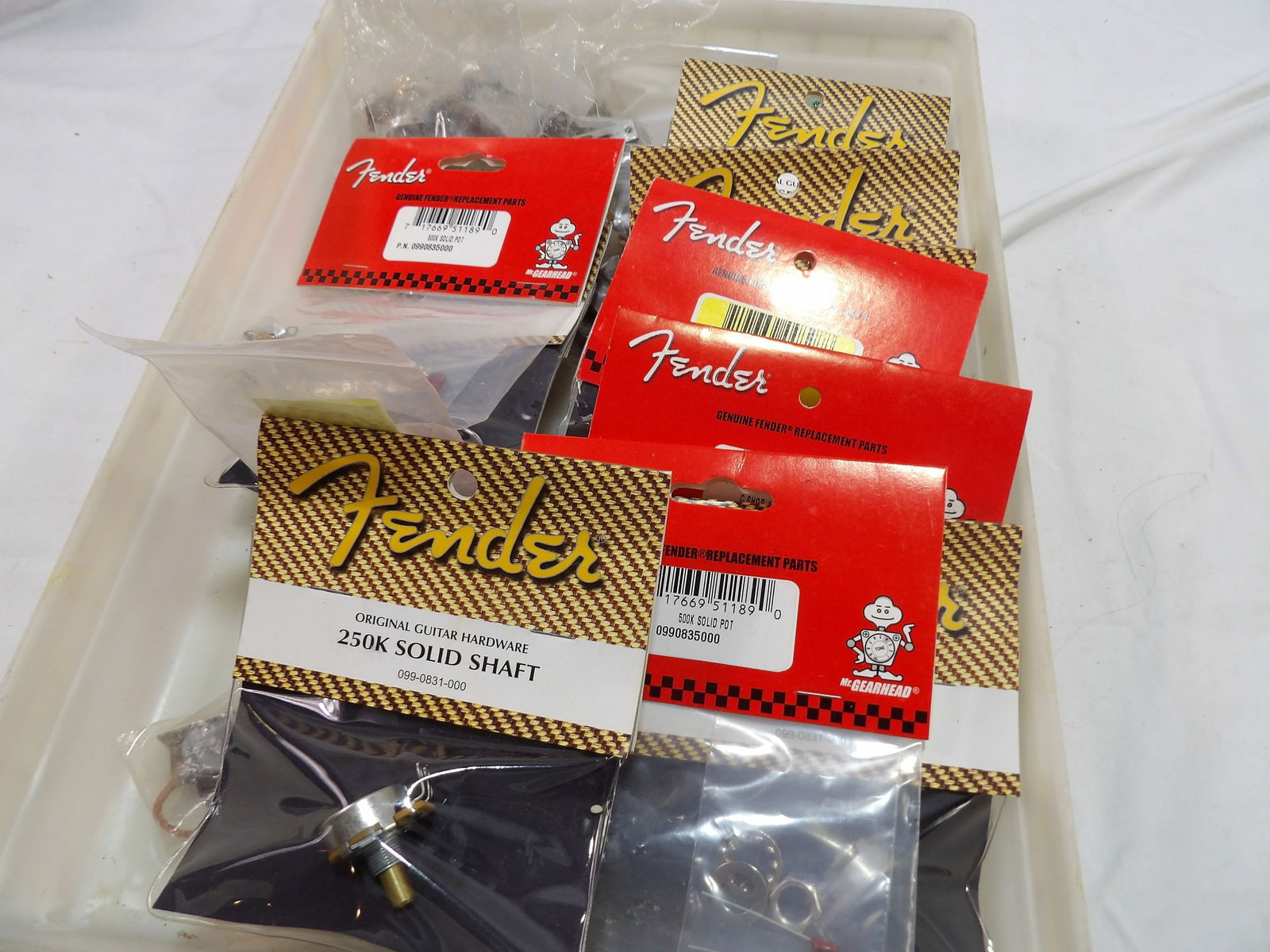 Large Lot of Fender Parts: Lot of Fender Switches and Potentiometers. All measurements are approximate. Please see photos for condition and details. Selling as is from 04281.