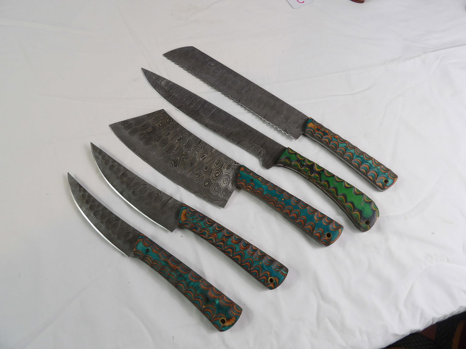 5 PCS MHS Cutlery: MHS Cutlery, Set of 5 Damascus Kitchen Knives. All measurements approximate. Please see photos for condition and details. Selling as is from 04281.