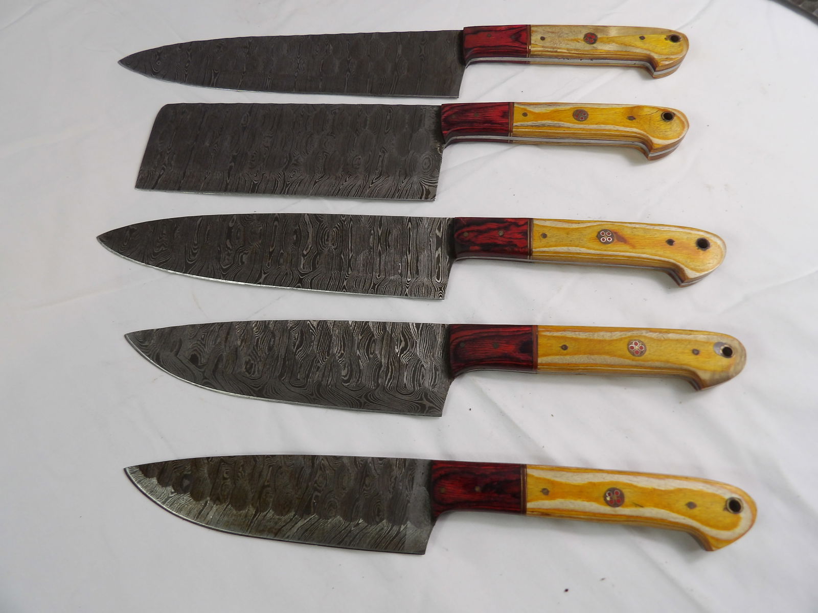 5 PCS MHS Cutlery: MHS Cutlery, Set of 5 Damascus Kitchen Knives. All measurements approximate. Please see photos for condition and details. Selling as is from 04281.