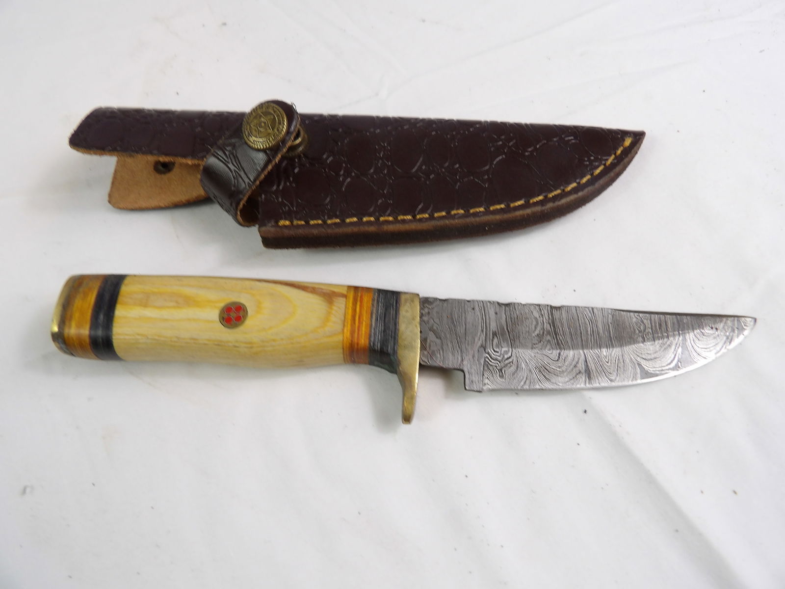 MHS Cutlery: MHS Cutlery, Hand Forged Damascus Blade with Sheath. All measurements approximate. Please see photos for condition and details. Selling as is from 04281.