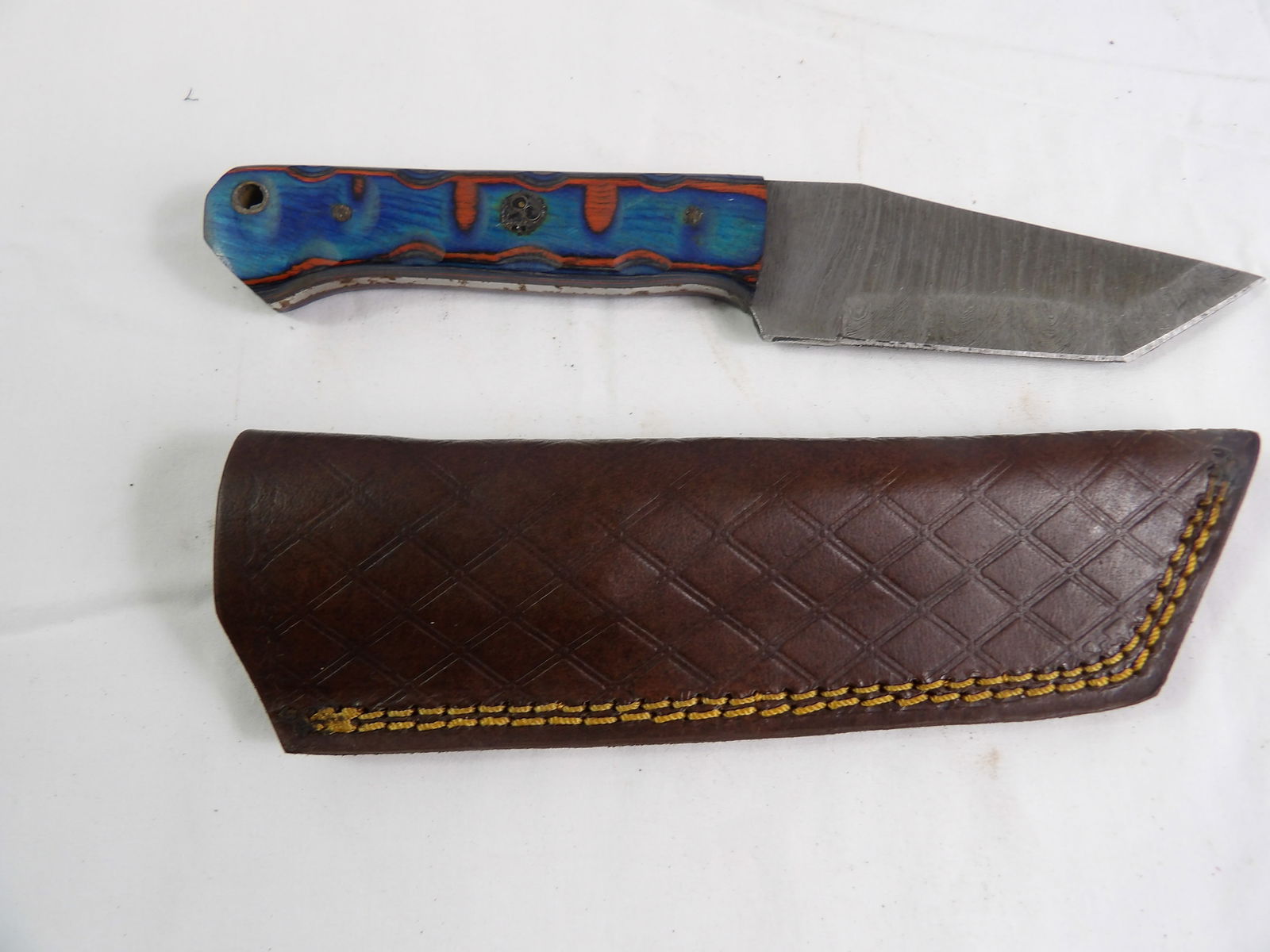 MHS Cutlery: MHS Cutlery Hand Forged Damascus Steel Fixed Blade with Sheath. All measurements approximate. Please see photos for condition and details. Selling as is from 04281.
