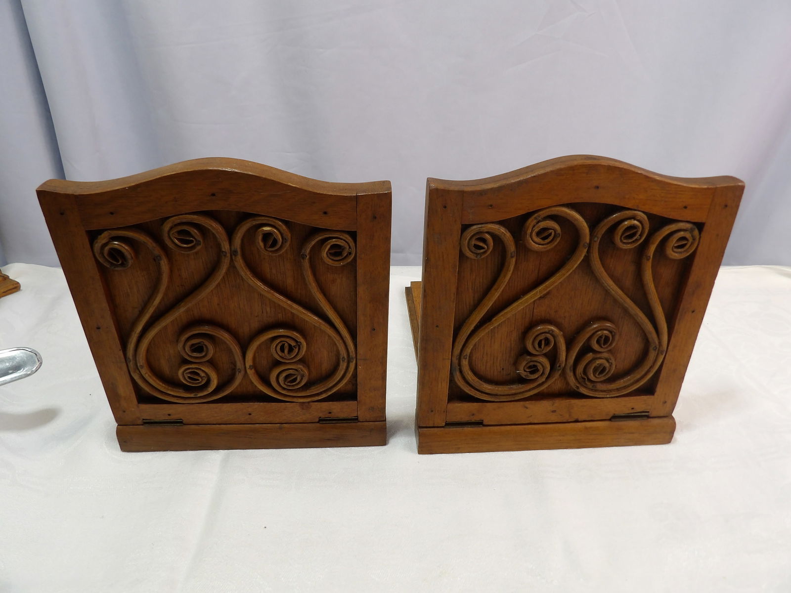 Oak Book Ends: Vintage Oak Book Ends with Scroll Design. All measurements approximate. Please see photos for condition and details. Selling as is from 04281.