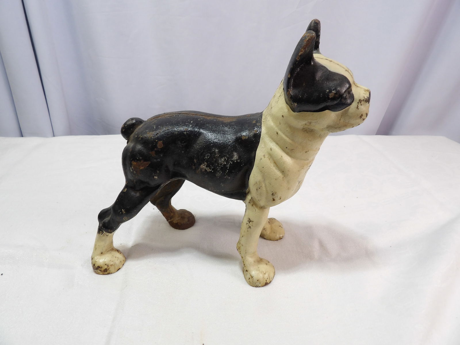 Cast Iron Doorstop: Vintage Cast Iron Boston Terrier Doorstop. All measurements approximate. Please see photos for condition and details. Selling as is from 04281.