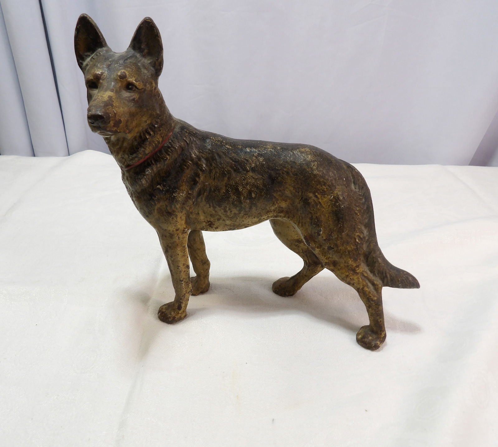 Cast Iron Statue: Antique Cast Iron German Shepherd. All measurements approximate. Please see photos for condition and details. Selling as is from 04281.