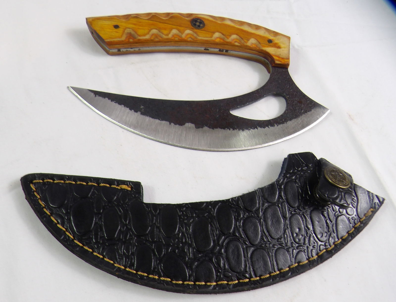 MHS Cutlery: MHS Cutlery Hand Forged Steel ULU Knife with Leather Sheath. All measurements approximate. Please see photos for condition and details. Selling as is from 04281.