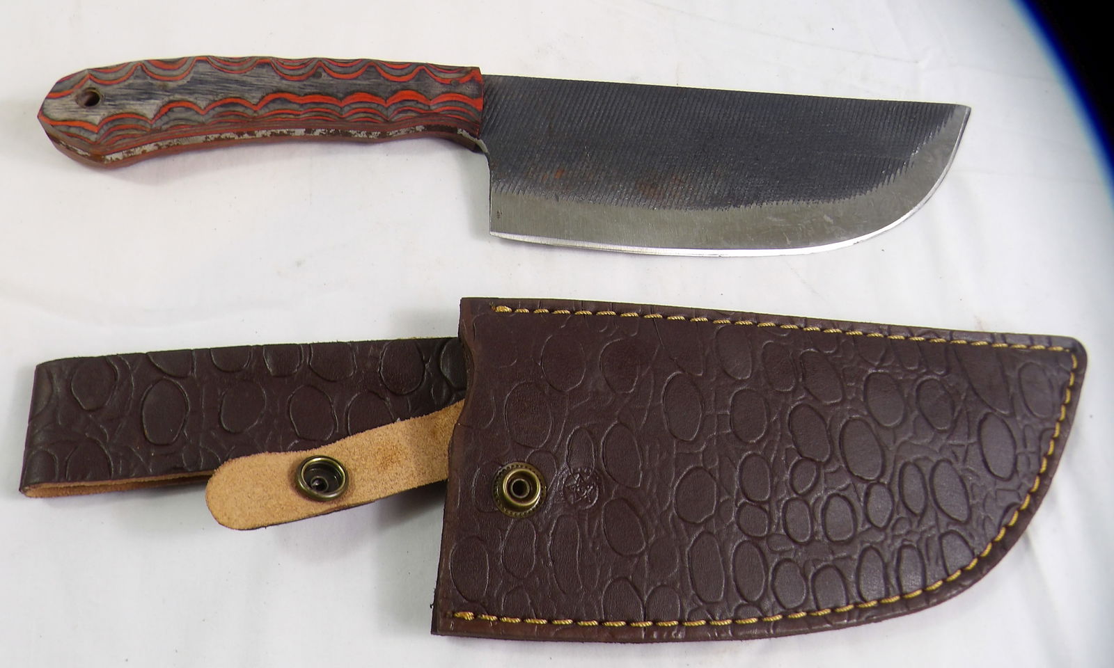 MHS Cutlery: MHS Cutlery Hand Forged Chef Cleaver with Leather Sheath. All measurements approximate. Please see photos for condition and details. Selling as is from 04281.