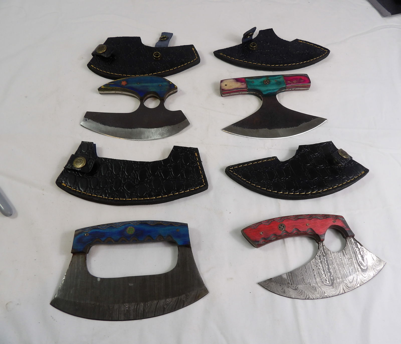 4 PCS MHS Cutlery: 4 Pieces MHS Cutlery Hand Forged ULU Knives, 2 Damascus Blades and 1 Steel Blades. All measurements approximate. Please see photos for condition and details. Selling as is from 04281.