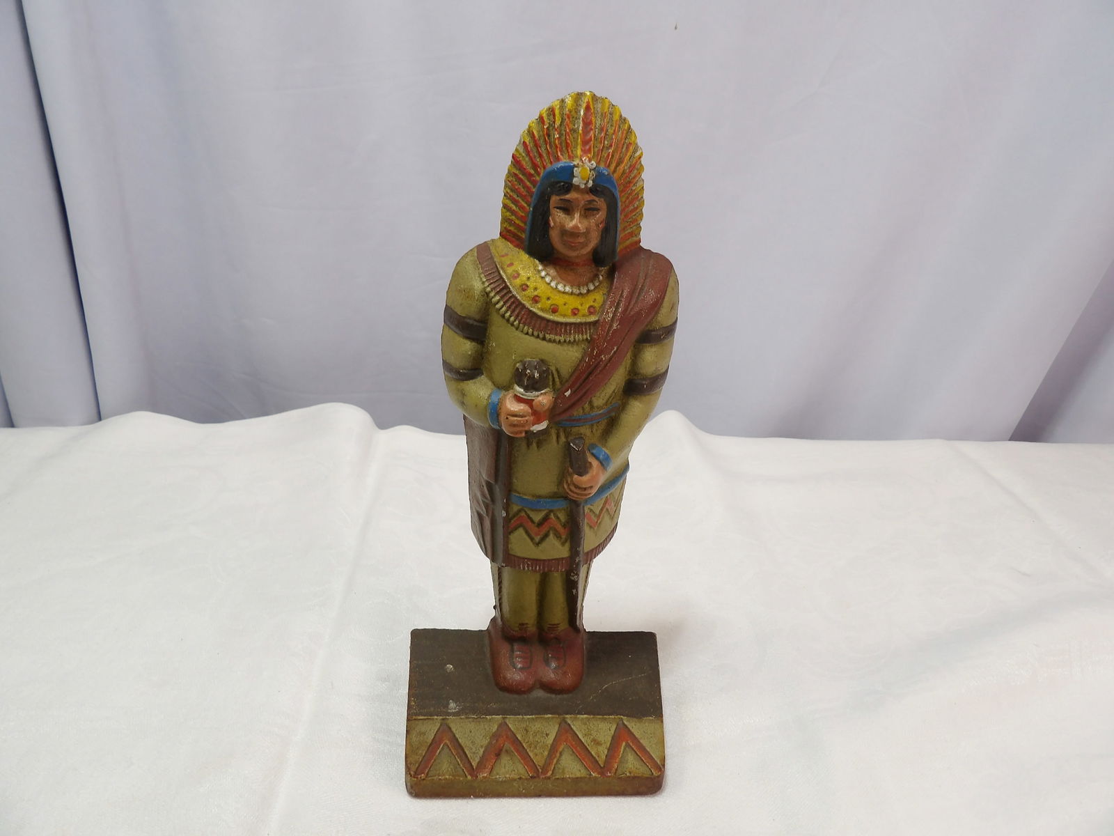 Cast Iron Doorstop: Cast Iron Sparta Group Native American Doorstop. 9 1/2". All measurements approximate. Please see photos for condition and details. Selling as is from 04281.