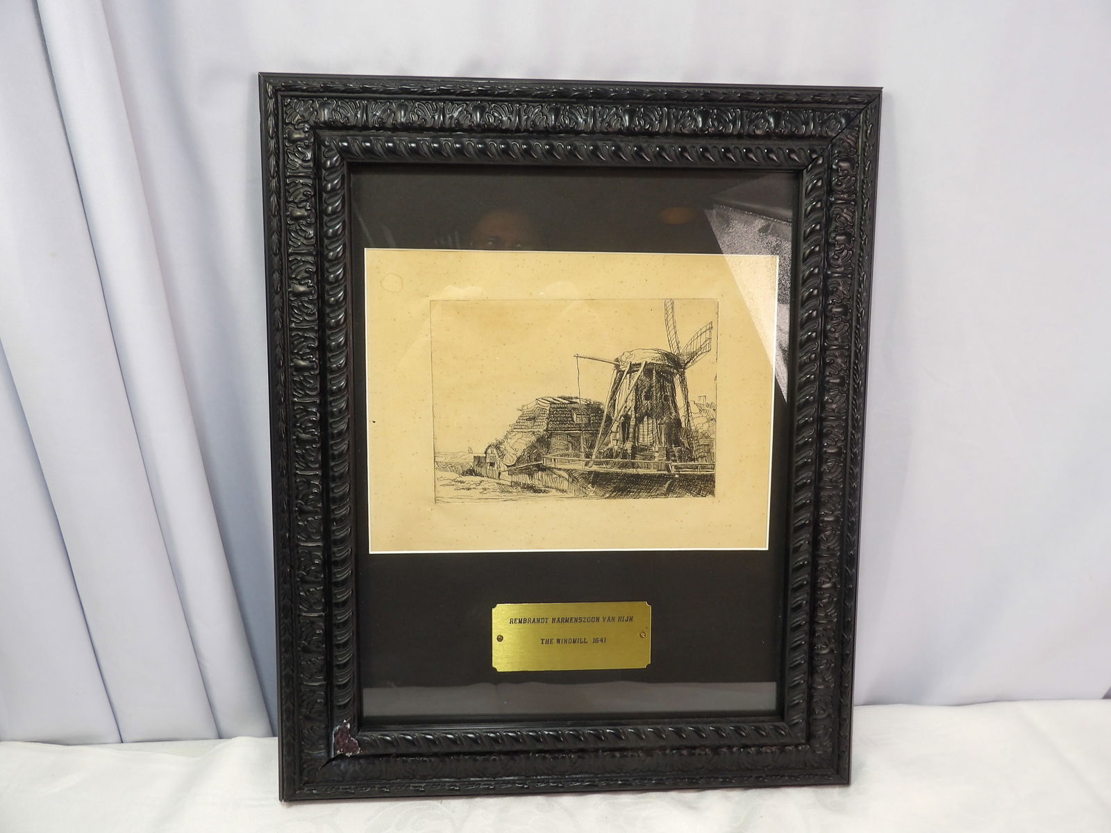 Rembrandt Etching: Rembrandt Etching "The Windmill 1641" 15" X 18". All measurements approximate. Please see photos for condition and details. Selling as is from 04281.
