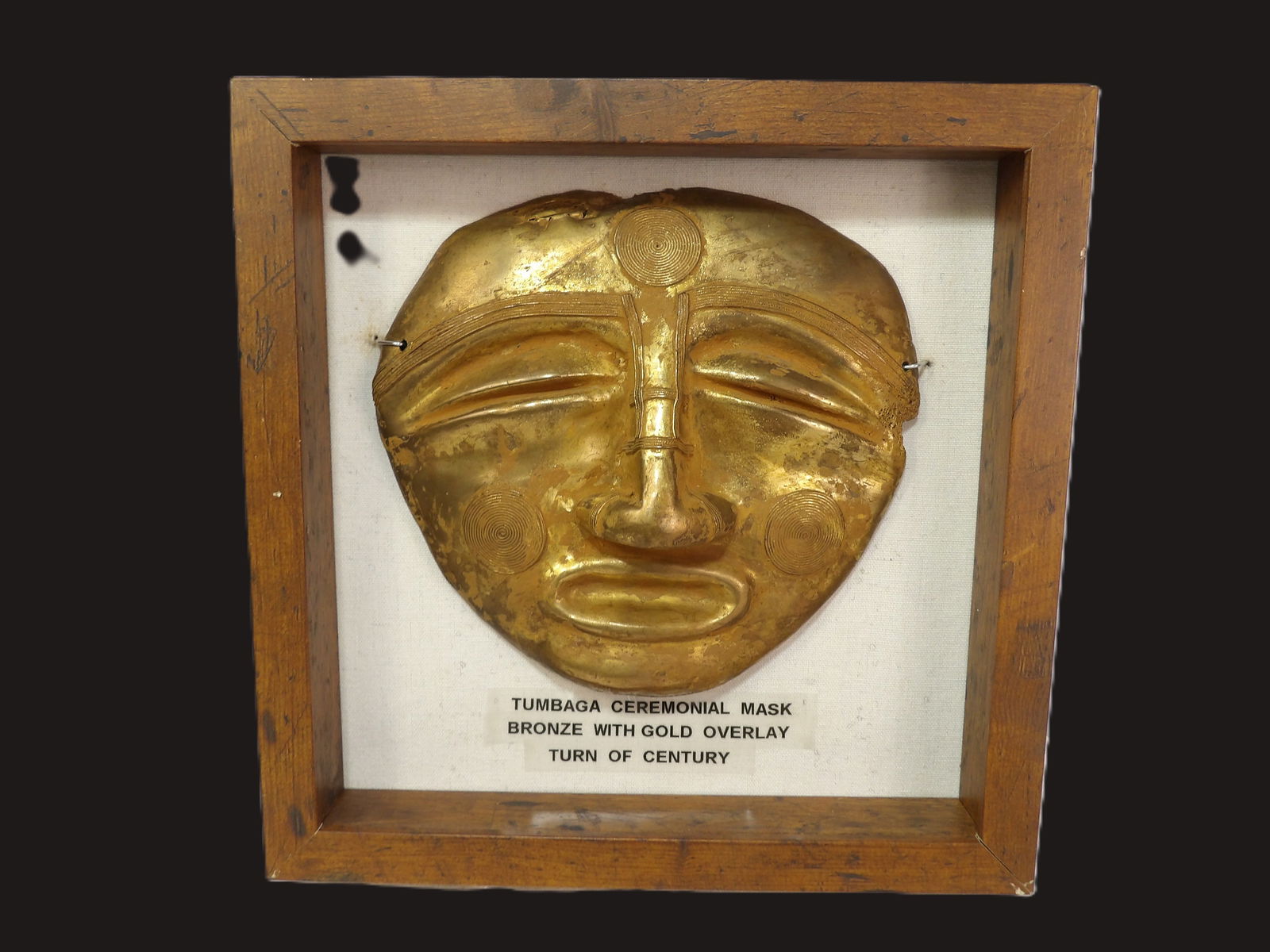 Ceremonial Mask: Tumbaga Ceremonial Mask, Bronze with Gold Overlay. Reflects Indigenous Artistry. Such Masks held Significant Cultural Importance. From Turn of the Century South America. **We are Not Experts in