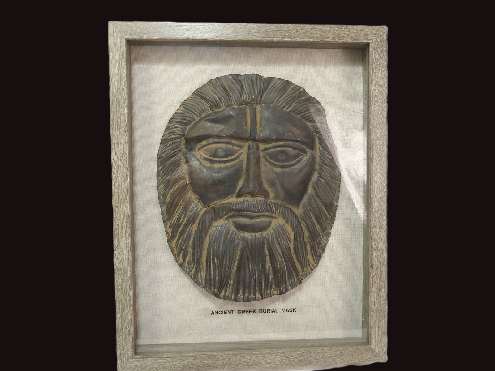 Grecian Burial Mask: Framed Ancient Greek Burial Mask. **We are Not Experts in Ancient Pieces. However, the Consignor of this Item is, and has been, a lifelong collector of Antiquities. This Item has not been