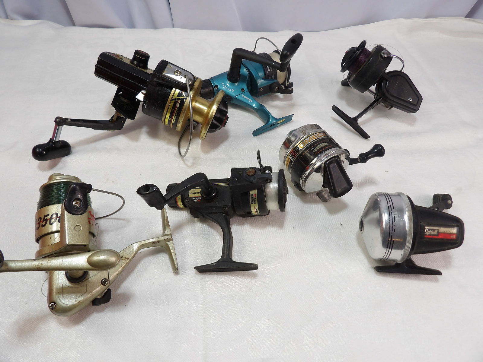 7 PCS Assorted Fishing Reels (1 of 4)
