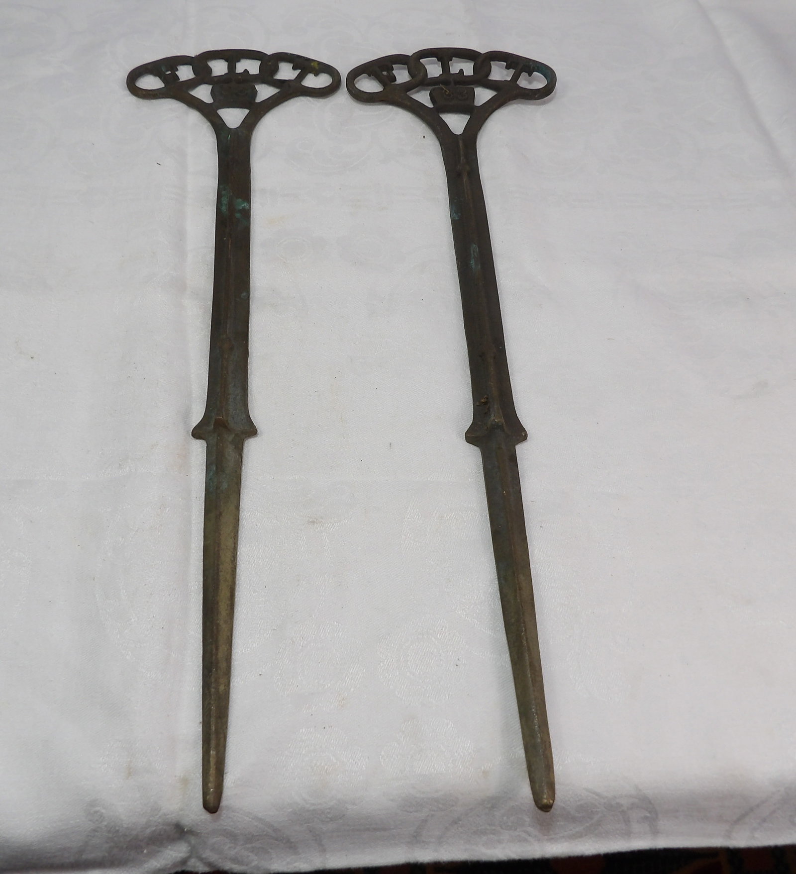 2 PCS Grave Marker Spikes: 2 Cast Iron Odd Fellows Grave Markers. All measurements approximate. Please see photos for condition and details. Selling as is from 04281.
