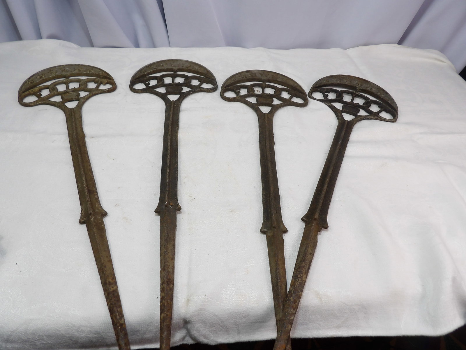 4 PCS Grave Marker Spikes: 4 Matching Cast Iron Odd Fellows Grave Markers. All measurements approximate. Please see photos for condition and details. Selling as is from 04281.