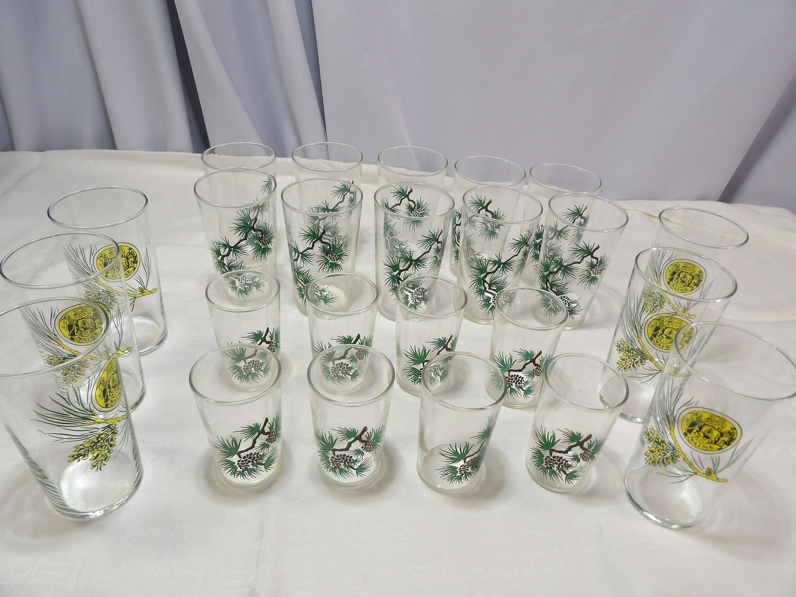 Set of Glasses: Vintage Set of Atlas Pine Cone Glasses, 6 with Maine State Seal. All measurements approximate. Please see photos for condition and details. Selling as is from 04281.