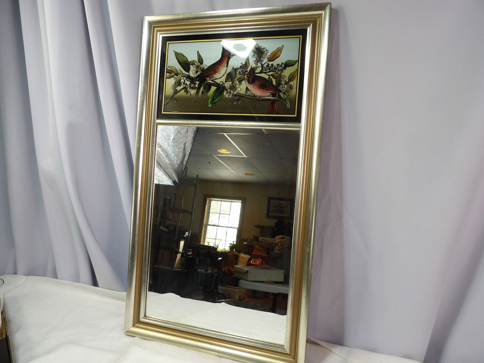 Framed Wall Mirror: Vintage Gold Framed Wall Mirror with Cardinal Art. All measurements approximate. Please see photos for condition and details. Selling as is from 04281.