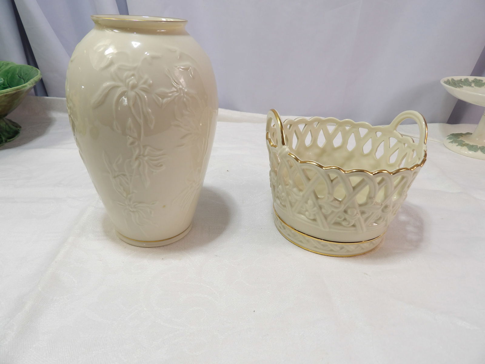 Porcelain Vase and Basket: Lennox Ivory Porcelain Vase and Basket. All measurements approximate. Please see photos for condition and details. Selling as is from 04281.
