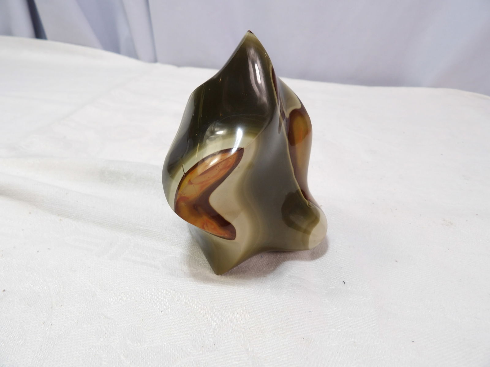 Flame Statue: Polychrome Jasper Flame Statue. All measurements approximate. Please see photos for condition and details. Selling as is from 04281.