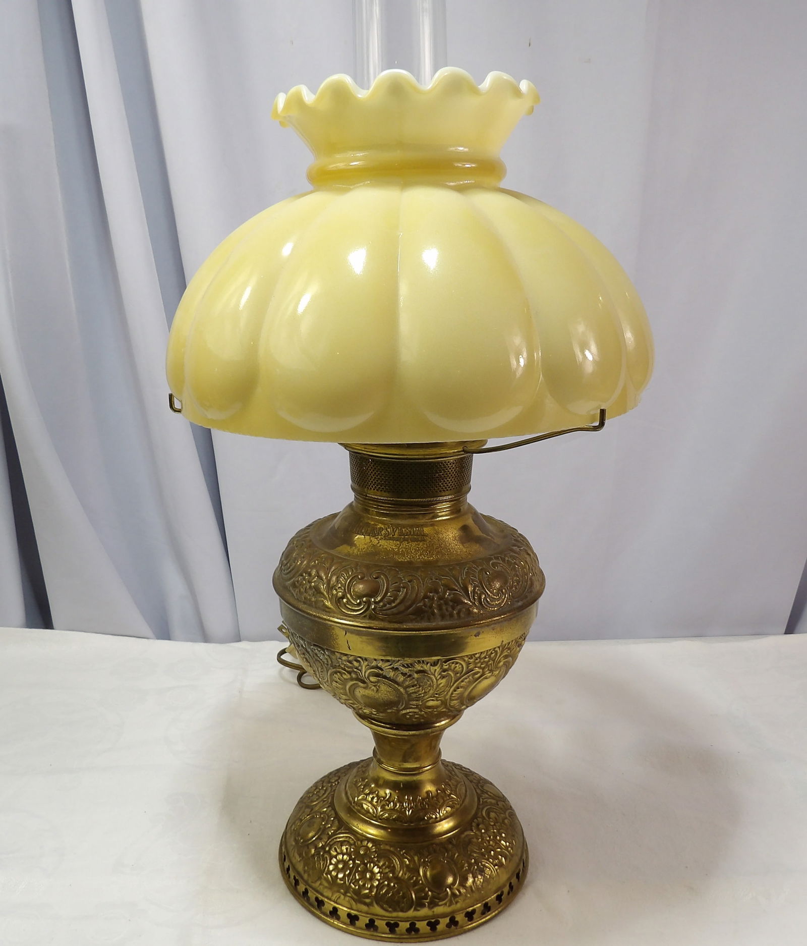 Electrified Oil Lamp: 18" Miller's Vestal Electrified Oil Lamp. All measurements approximate. Please see photos for condition and details. Selling as is from 04281.