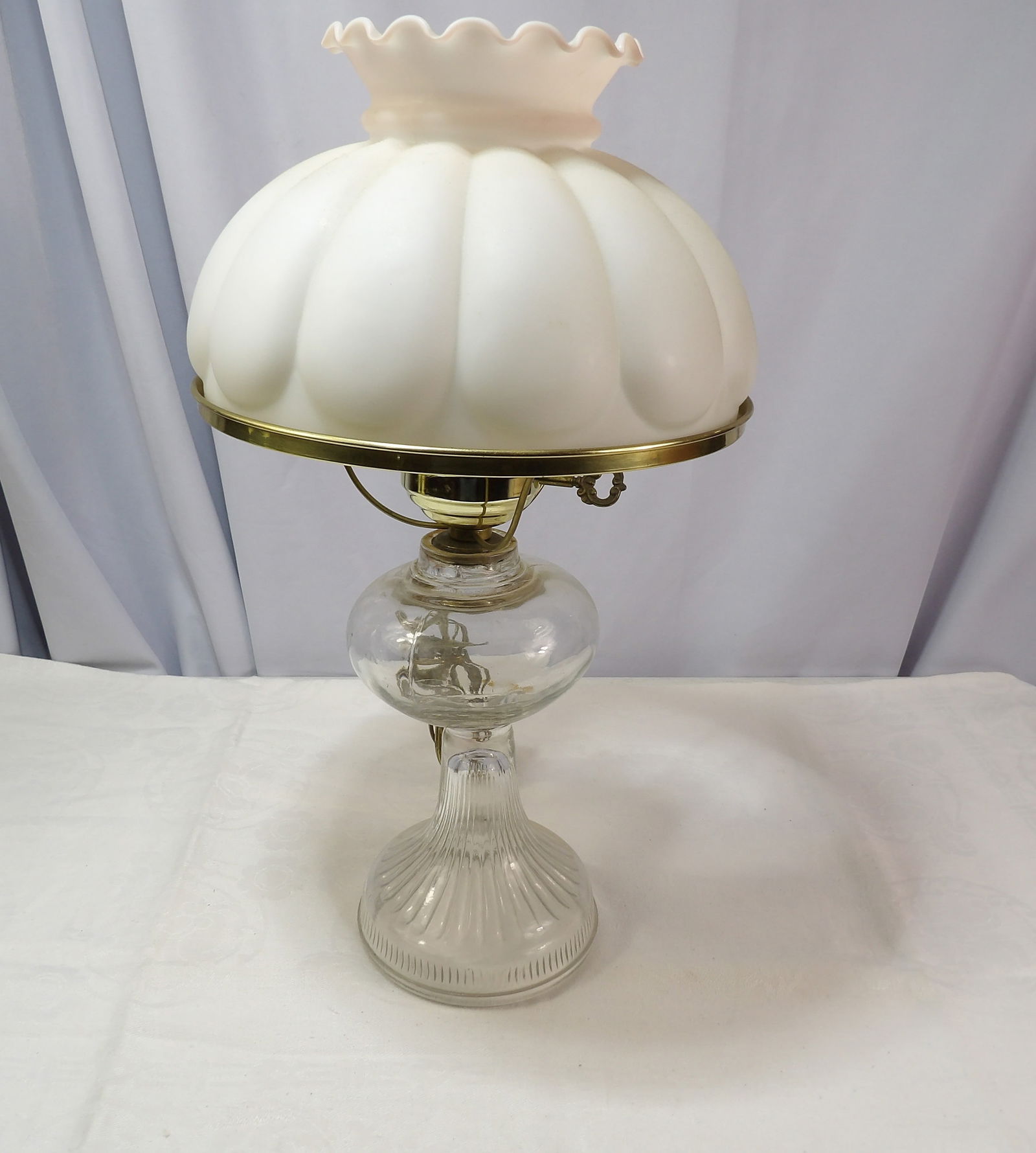 Electrified Oil Lamp: 18" Electrified Oil Lamp. All measurements approximate. Please see photos for condition and details. Selling as is from 04281.
