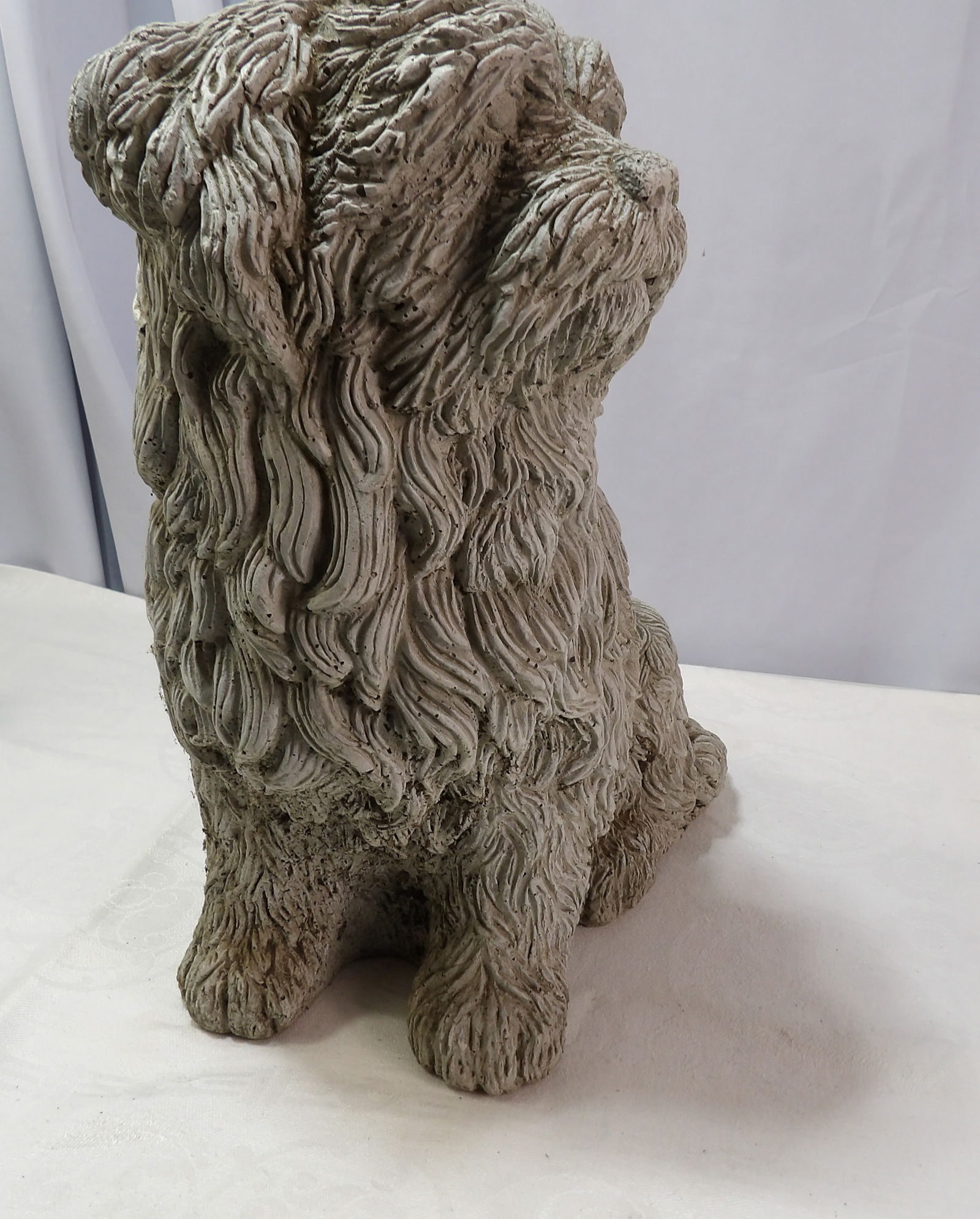 Concrete Garden Statue: 14" Concrete Dog Garden Statue. All measurements approximate. Please see photos for condition and details. Selling as is from 04281.