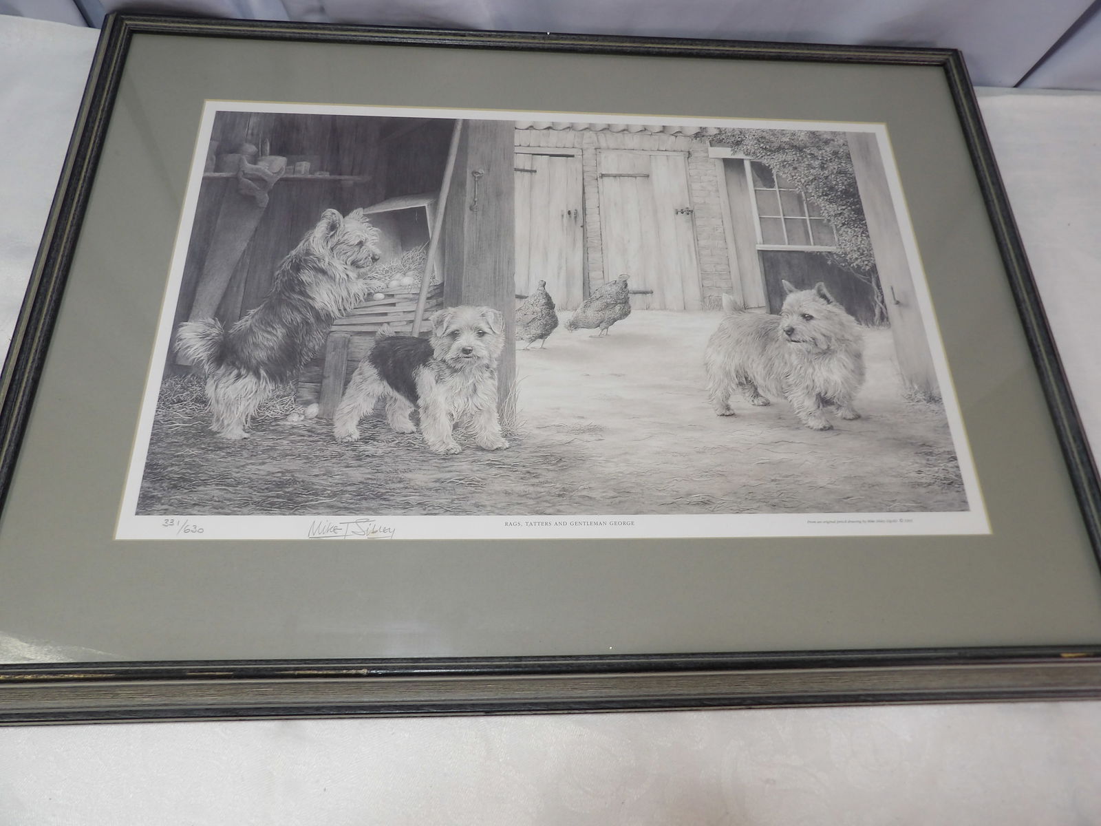 Signed and Numbered Print by Mike Sibley: 20" X 29" "Rags, Tatters and Gentleman George" Signed and Numbered Print, from an Original Pencil Drawing by Mike Sibley. All measurements are approximate. Please see photos for condition and