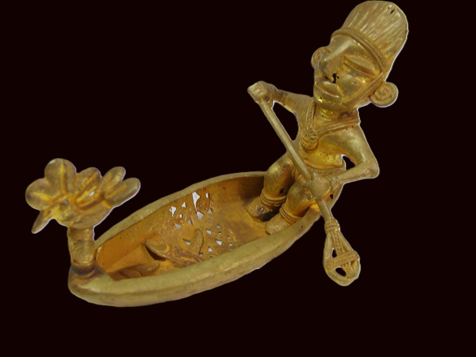 Brass Tribal Figurine: Brass Ashanti Tribal Figure, Man in a Boat with Fish, 1500 A.D., Likely African. ***We are Not Experts in Ancient Pieces. However, the Consignor of this Item is, and has been, a lifelong collector of