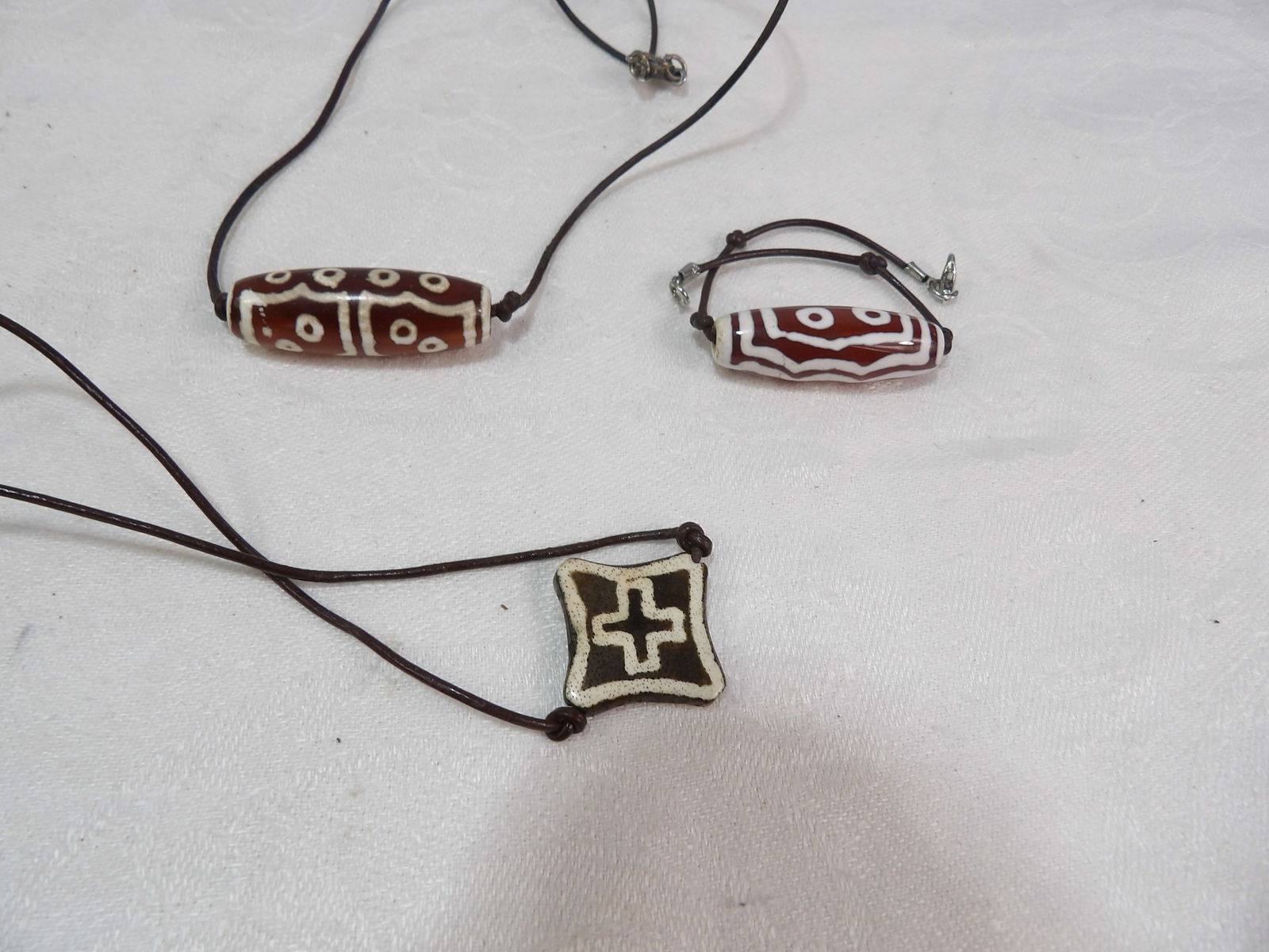 3 PCS Tibetan Beads: Collection of 3 Tibetan Dzi Agate Beads. Tibet or South East Asia. ***We are Not Experts in Ancient Pieces. However, the Consignor of this Item is, and has been, a lifelong collector of Antiquities. T