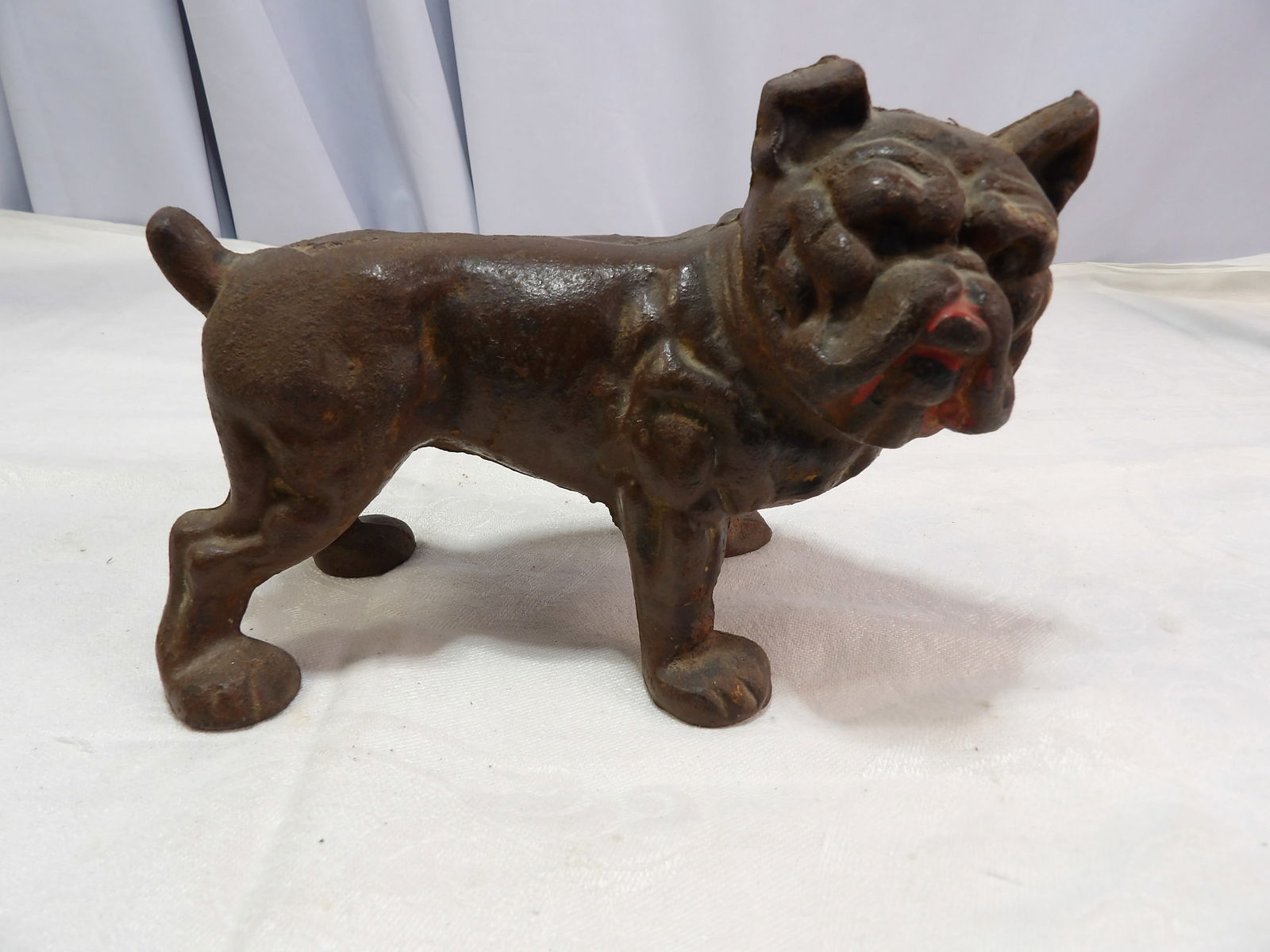 Vintage Cast Iron Dog: Vintage Cast Iron Bulldog. All measurements approximate. Please see photos for condition and details. Selling as is from 04281.