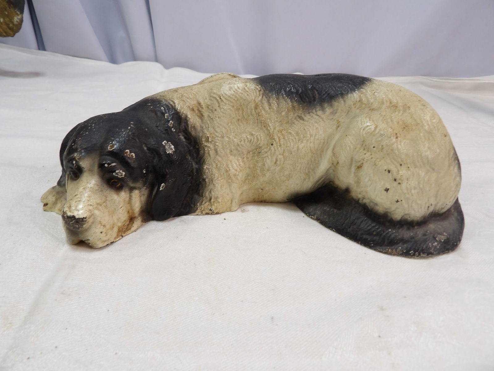 Vintage Cast Iron Bank: Vintage Cast Iron Sleeping Dog Bank. All measurements approximate. Please see photos for condition and details. Selling as is from 04281.