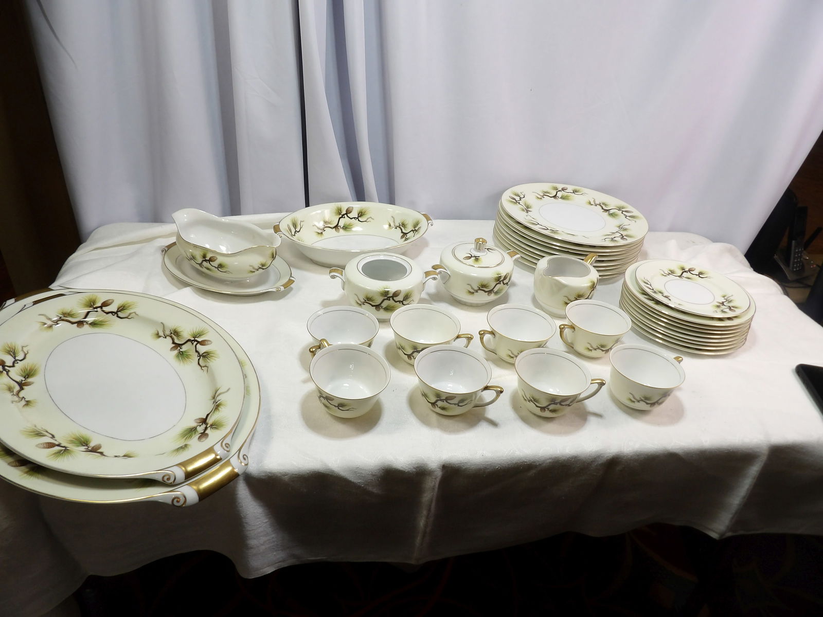Porcelain Dish Set: Large Narumi China "Shasta Pine" Porcelain Set. All measurements approximate. Please see photos for condition and details. Selling as is from 04281.
