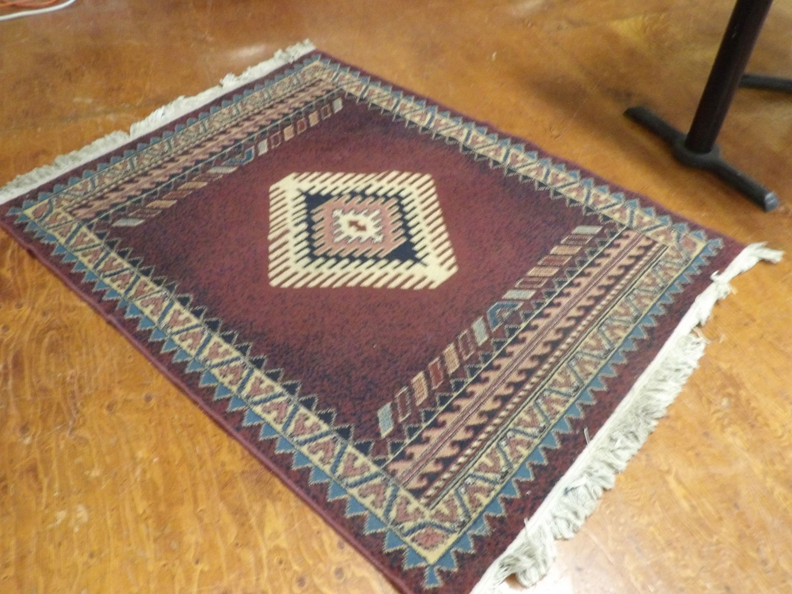 Area Rug: Southwestern Style Area Rug. 47" X 66". All measurements approximate. Please see photos for condition and details. Selling as is from 04281.