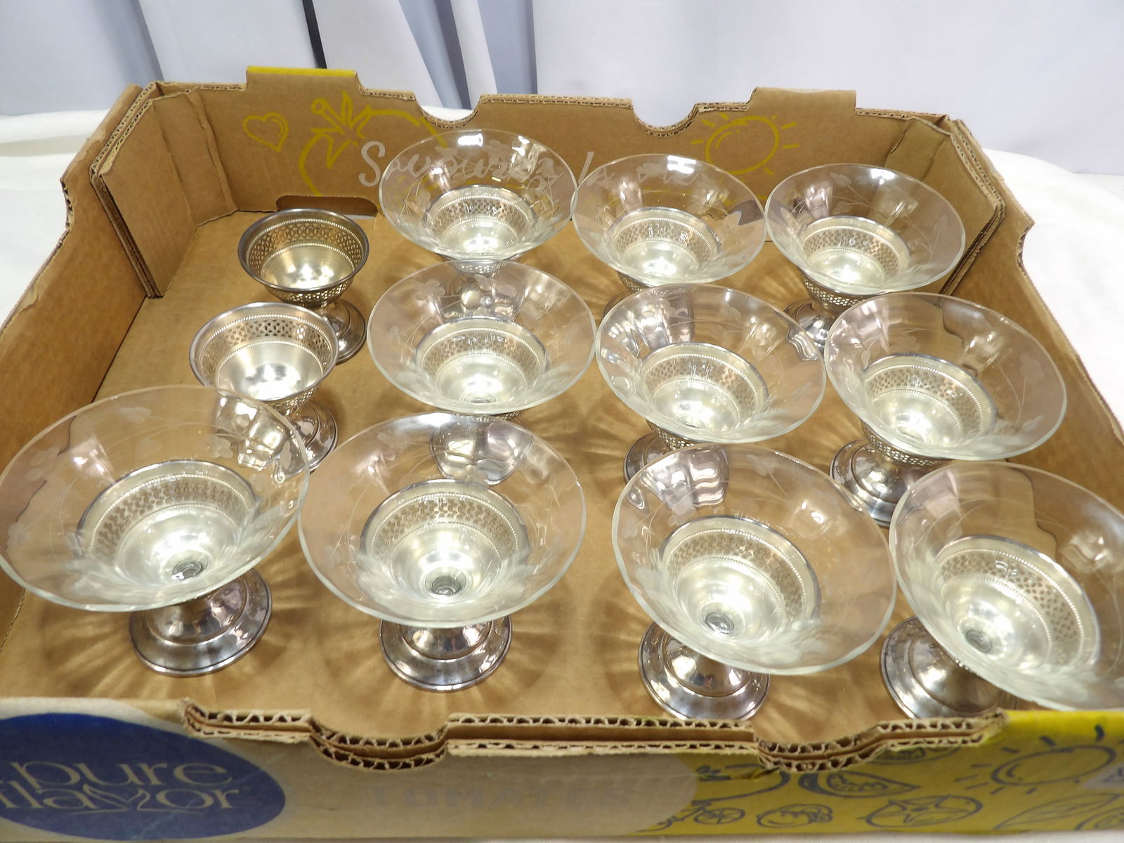 10 PCS Sherbet Cups: 10 Sterling Silver and Etched Glass Sherbet Cups. 2 More Sterling Bases with no glass. Each Base weighs 1 oz. without glass. 12 oz. Sterling total. All measurements approximate. Please see