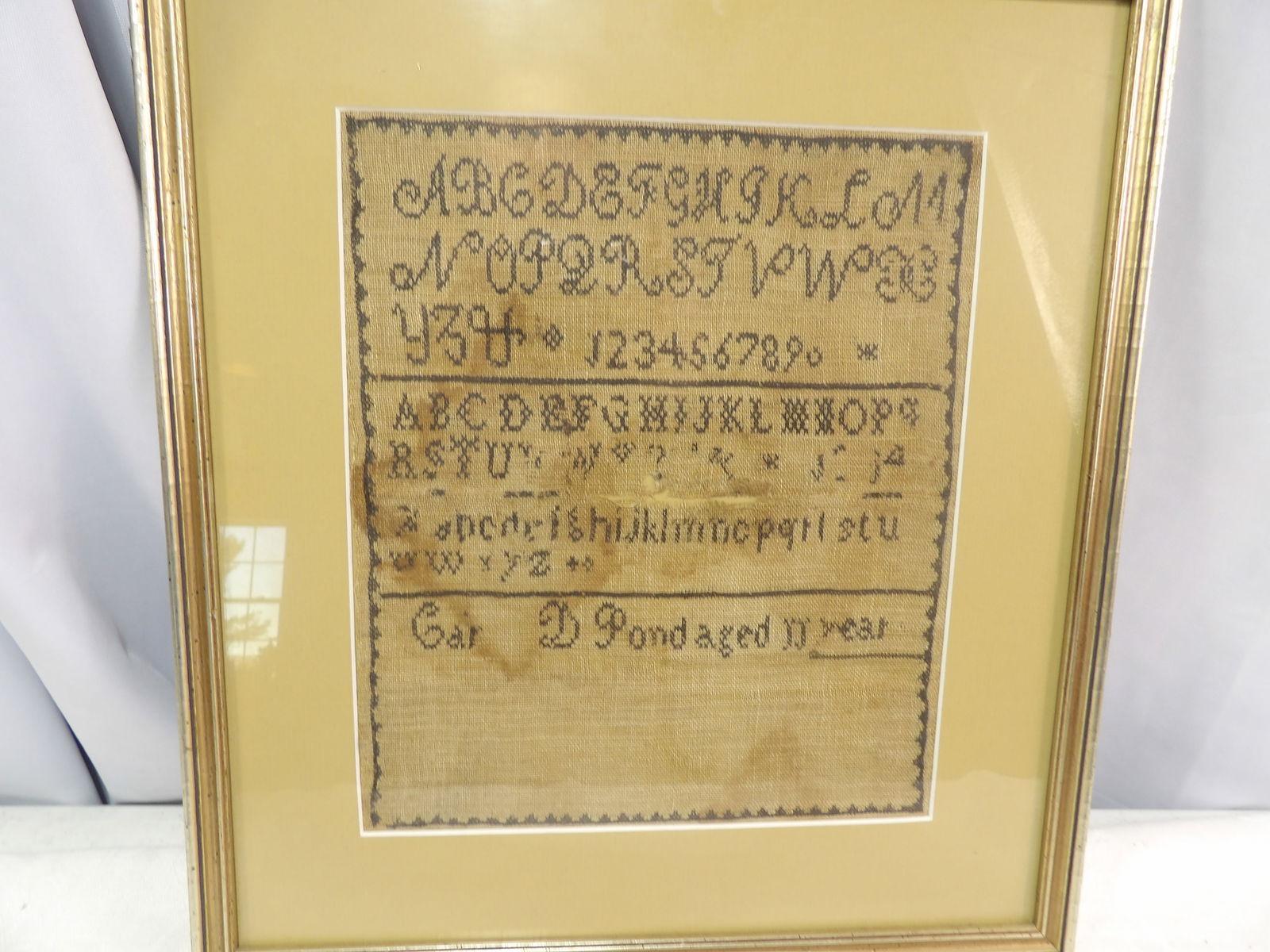 Antique Sampler: Atique Embroidered Alphabet Sampler. 13" X 15", 1817. All measurements approximate. Please see photos for condition and details. Selling as is from 04281.