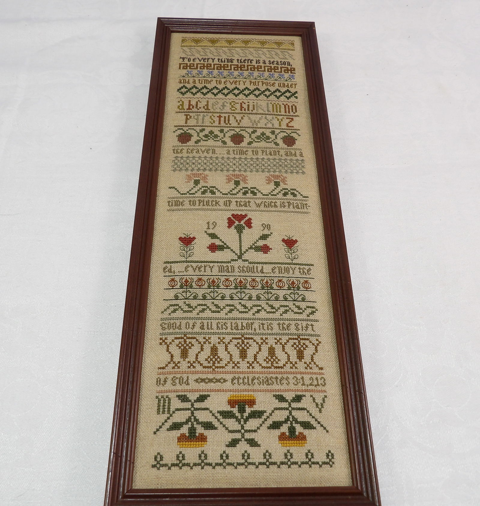 Framed Sampler: Framed Cross Stitch Sampler. 1990. 6 1/2" X 17 1/2" . All measurements approximate. Please see photos for condition and details. Selling as is from 04281.