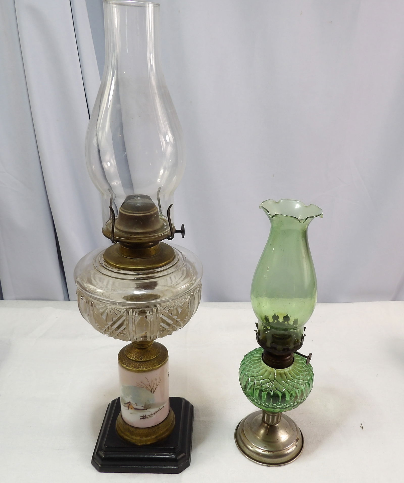 Pair of Vintage Oil Lamps: Pair of Vintage Oil Lamps "Unique". All measurements approximate. Please see photos for condition and details. Selling as is from 04281.