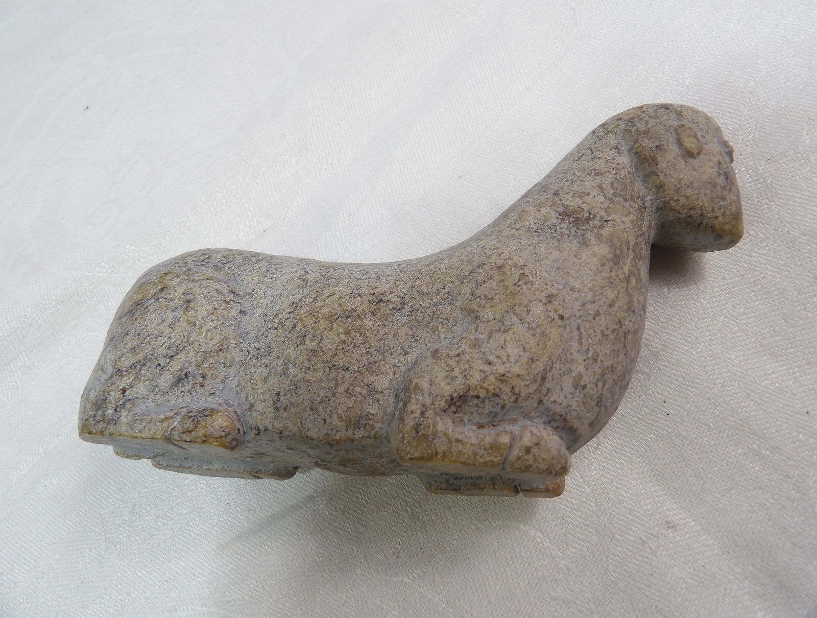Hand Carved Figurine: Soapstone or Hand Carved Stone Figure. Possibly African. All measurements approximate. Please see photos for condition and details. Selling as is from 04281.