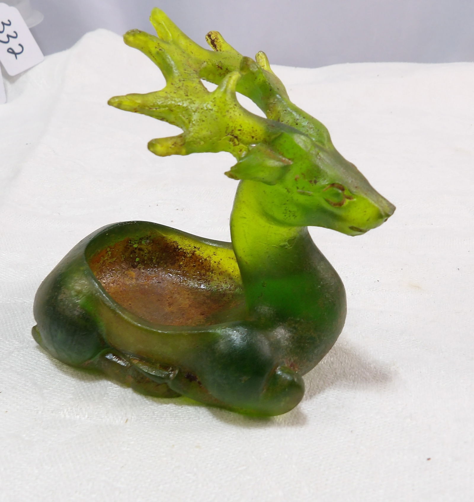 Green Glass Deer Figurine: Vintage Green Glass Deer Figurine. All measurements approximate. Please see photos for condition and details. Selling as is from 04281.