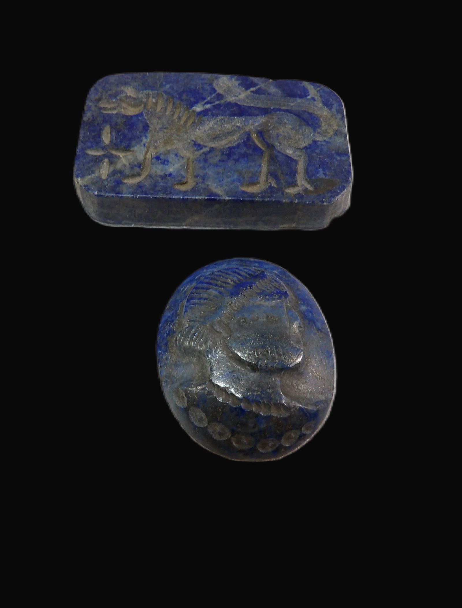 2 PCS Lapis Lazuli Carvings: 2 Lapis Lazuli Carvings, Rectagular Plaque with Griffin, and an Oval Cameo Profile. Likely Egyptian. ***We are Not Experts in Ancient Pieces. However, the Consignor of this Item is, and has