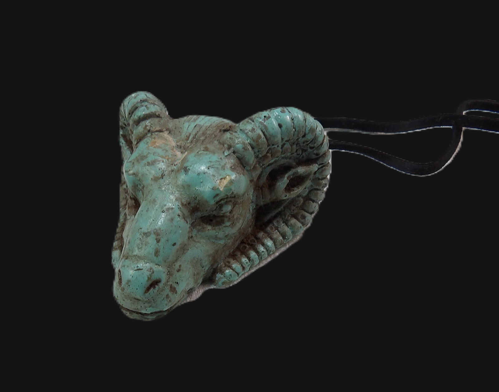 Rams Head Amulet: Early Ram's Head Amulet. All measurements approximate. Please see photos for condition and details. Selling as is from 04281.