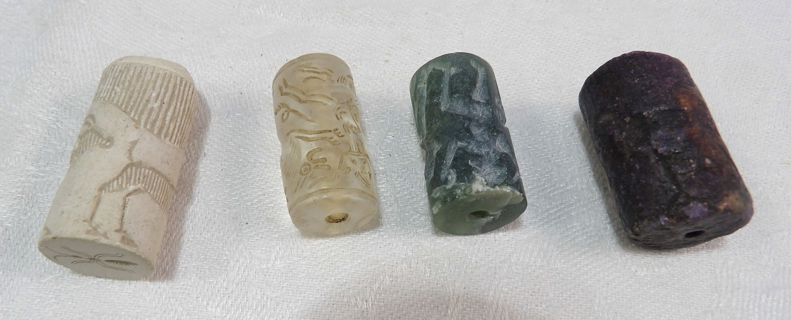 4 PCS Ancient Seals: Set of 4 Ancient Cylinder Seals. Lare Bronze Age. Mesopotamia. ***We are Not Experts in Ancient Pieces. However, the Consignor of this Item is, and has been, a lifelong collector of Antiquities.