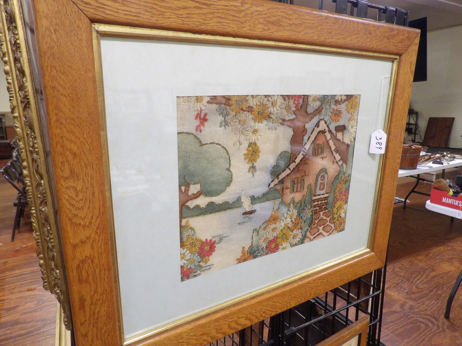 Vintage Embroidered Tapestry: Vintage Embroidered Tapestry "Cottage by the Lake". 19" X 24". All measurements approximate. Please see photos for condition and details. Selling as is from 04281.