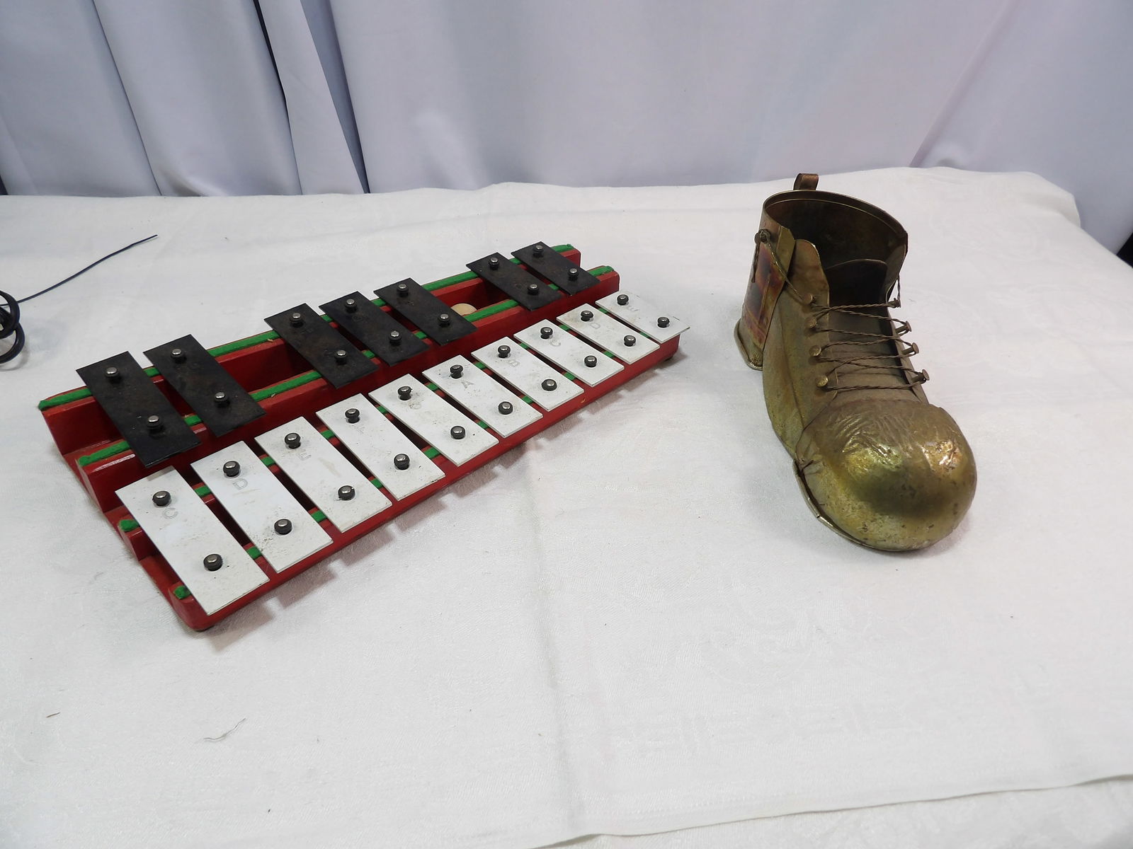 Music Box: Student Metallophone and Brass Shoe Music Box. All measurements approximate. Please see photos for condition and details. Selling as is from 04281.