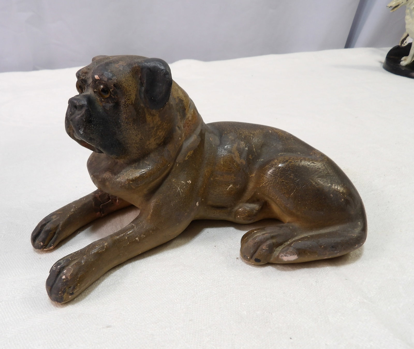 Terracotta Dog Figurine: Early Terracotta Bulldog Figurine. All measurements approximate. Please see photos for condition and details. Selling as is from 04281.