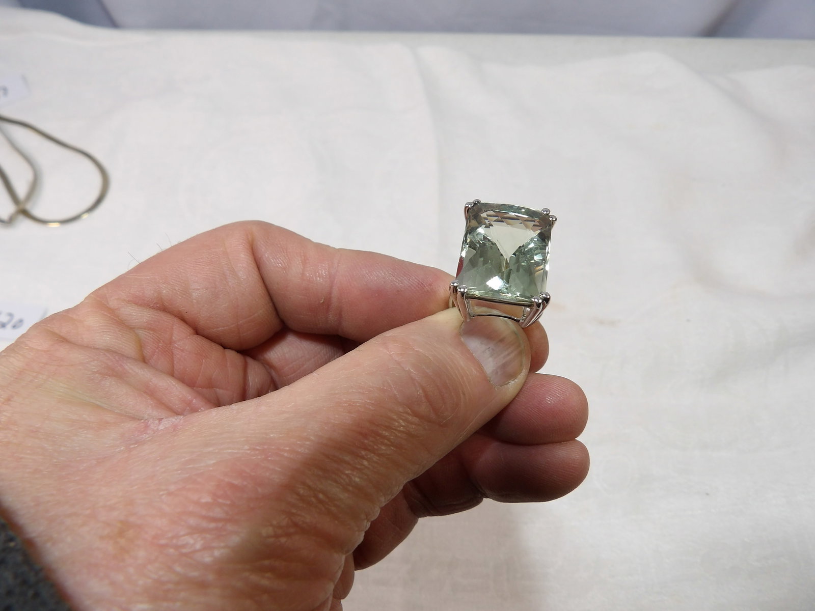 Large Stone in Sterling Silver Ring: Large Green Amethyst/Prasiolite Ring in Sterling Silver. Size 6 1/2. All measurements approximate. Please see photos for condition and details. Selling as is from 04281.