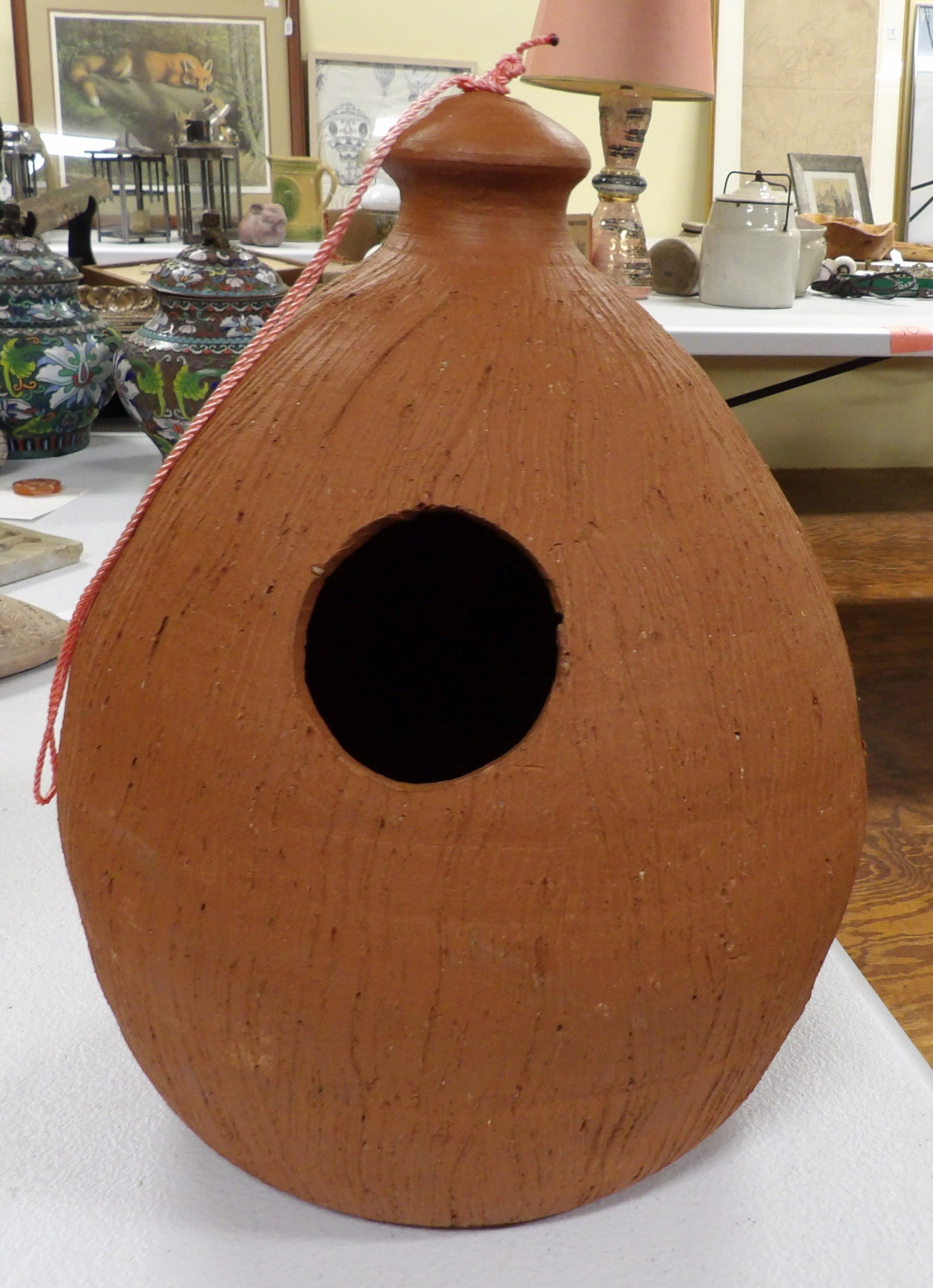 Large Earthenware Birdhouse: Large Sri Lankan Handmade Earthenware Birdhouse, 11" Tall. All measurements approximate. Please see photos for condition and details. Selling as is from 04281.